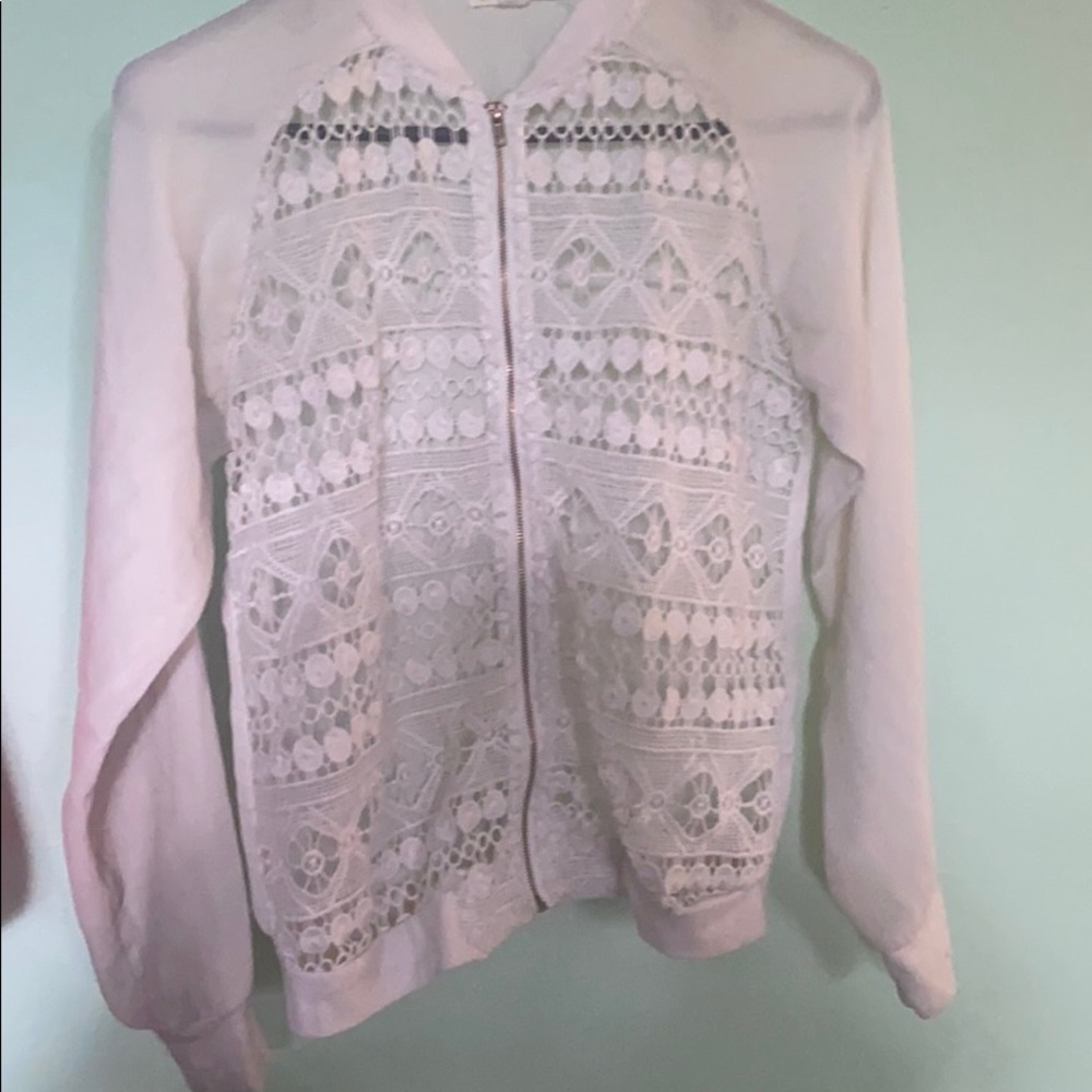 White throw over sweater
